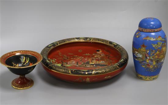 Two Carlton ware Temple and Mikado pattern red ground dishes and a similar blue ground jar and cover (3) largest diameter 28cm